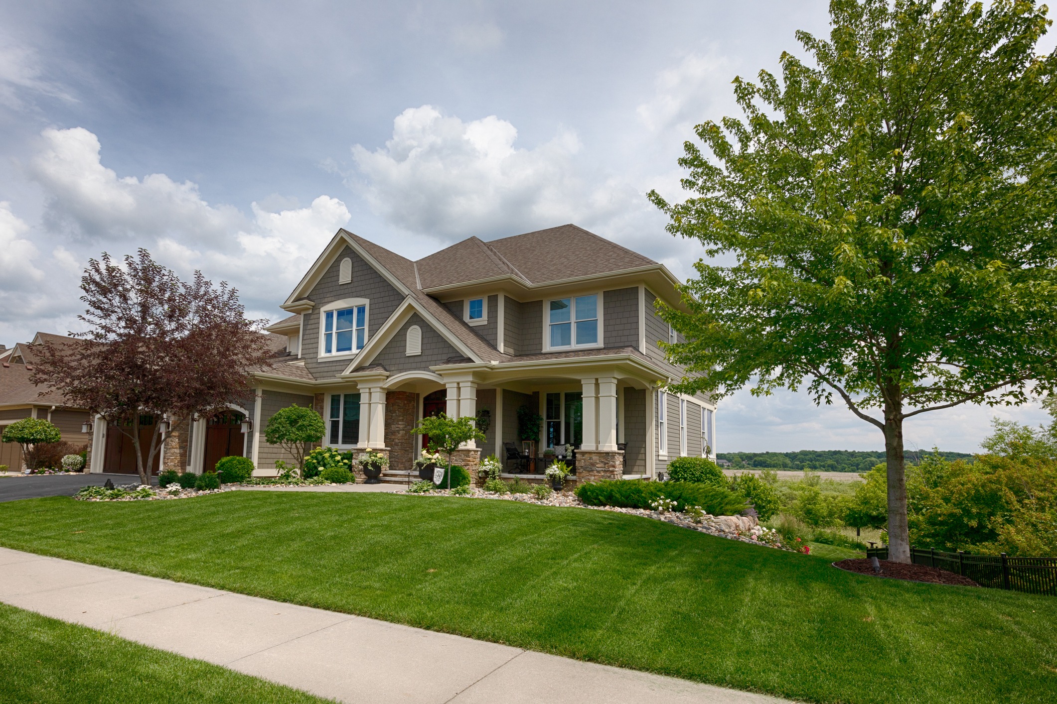 The front yard of a home on an overcast day.